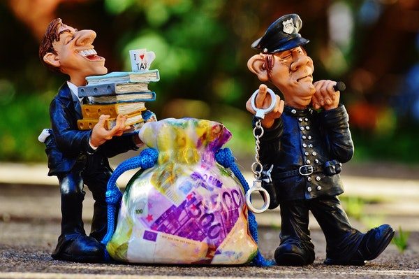Taxes Tax Evasion Police Handcuffs