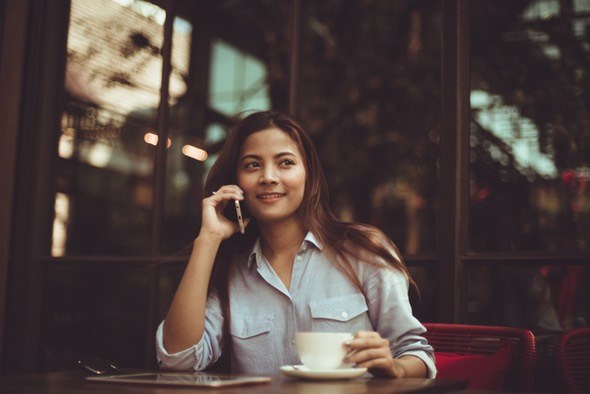 Girl Using A Mobile Phone